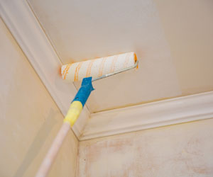 painting the ceiling with a roller